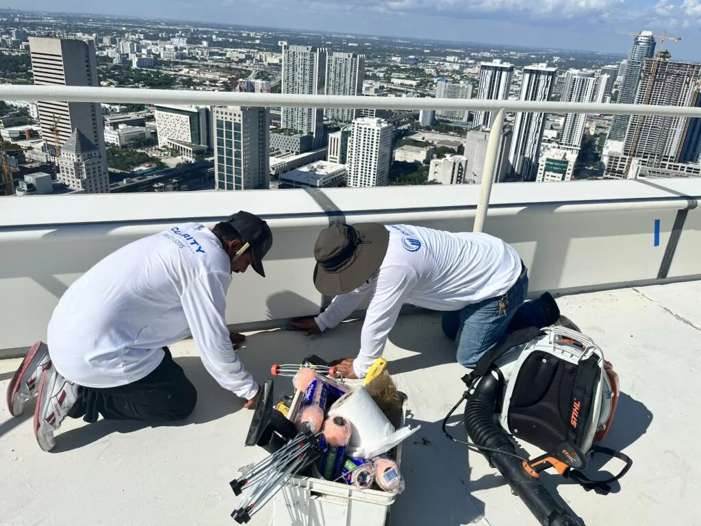 Clarity Roofing crew completing a commercial roof replacement in Broward County