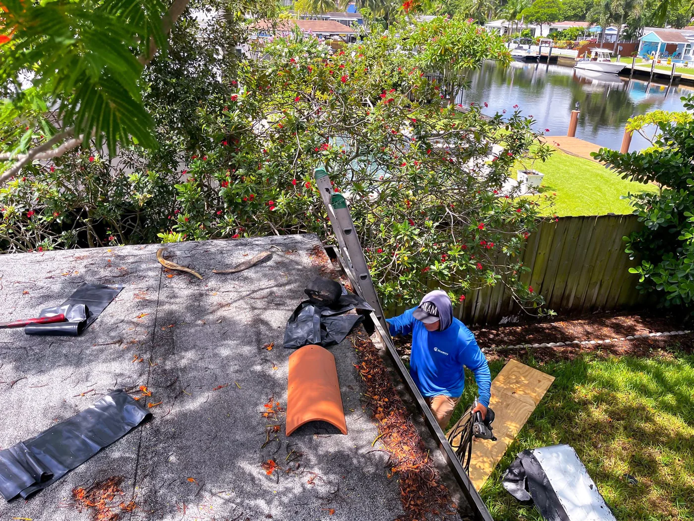 Clarity Roofing team completing a residential roof repair in South Florida